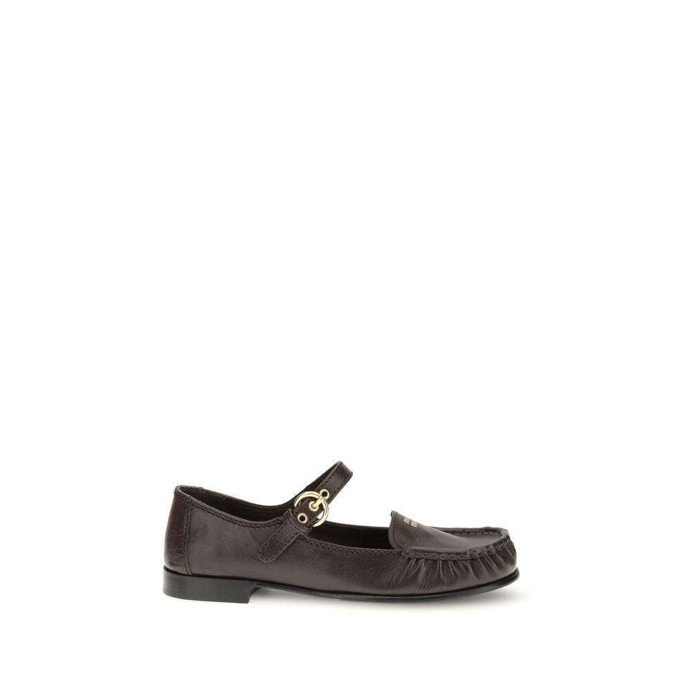 Miu Miu Brown Calf Leather Bos Taurus Slip-On Loafers - Brown loafer shoe on a white background