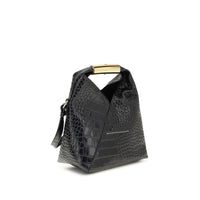 MM6 Black Calf Leather Bos Taurus Handbag - Black textured handbag with a gold handle on a white background