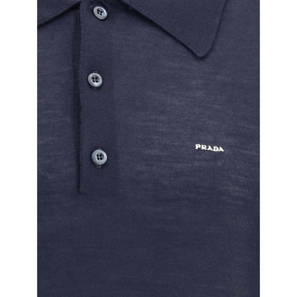 Navy blue Prada polo shirt with buttons on a white background