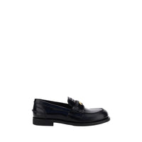 Miu Miu Black Rubber Slip-On Loafers
