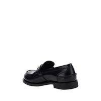 Miu Miu Black Rubber Slip-On Loafers