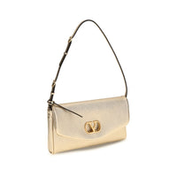 Valentino Garavani Gold Lamb Ovis Aries Aries Clutch Bag
