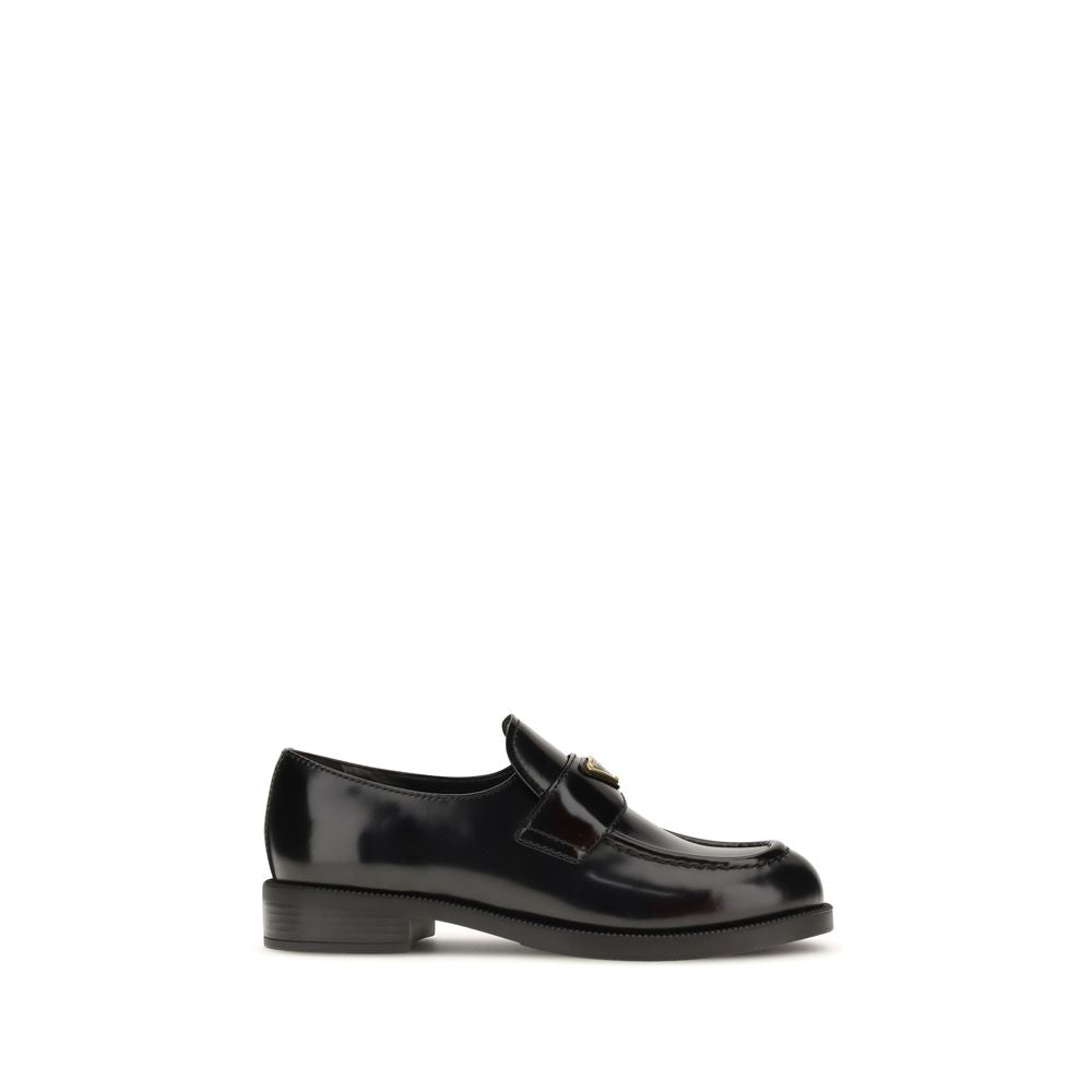 

Prada
Black Calf Leather Bos Taurus Slip-On Loafers - Black leather loafer on a white background