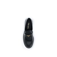 Prada
Black Calf Leather Bos Taurus Slip-On Loafers - Black leather loafer on a white background